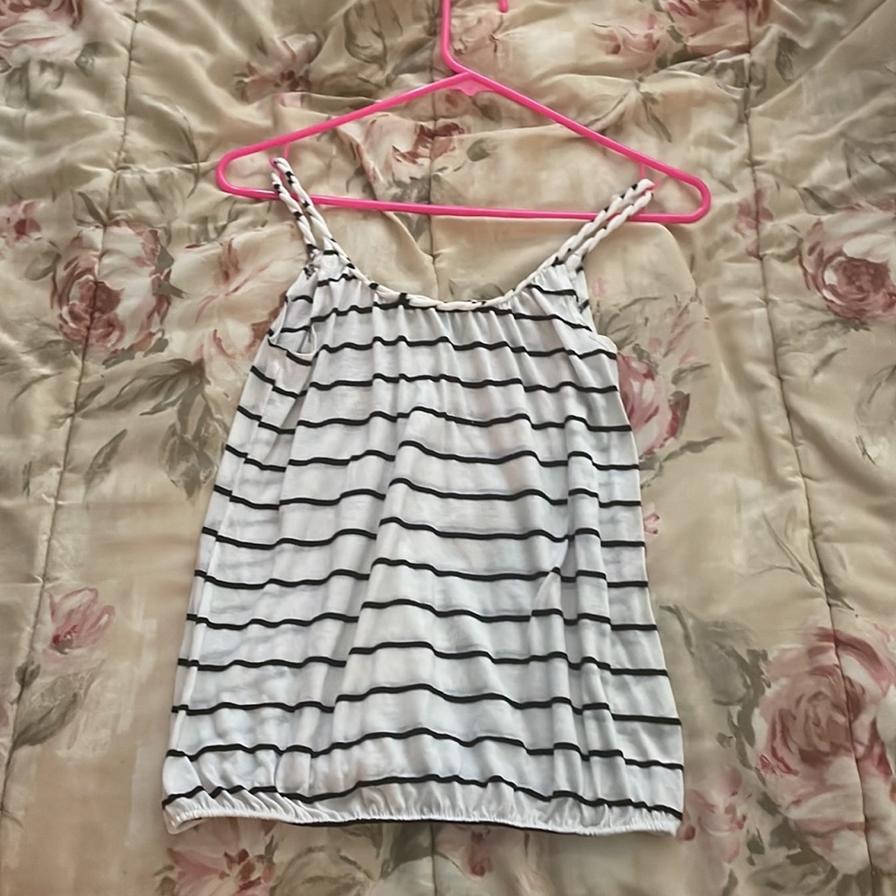 A casual striped tank top with rolled style straps